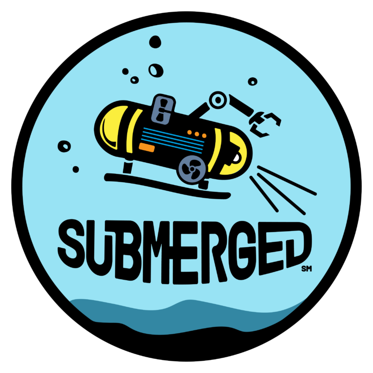 Logo showing 2024-25 season theme. A circular badge with a submarine and the SUBMERGED logo text.